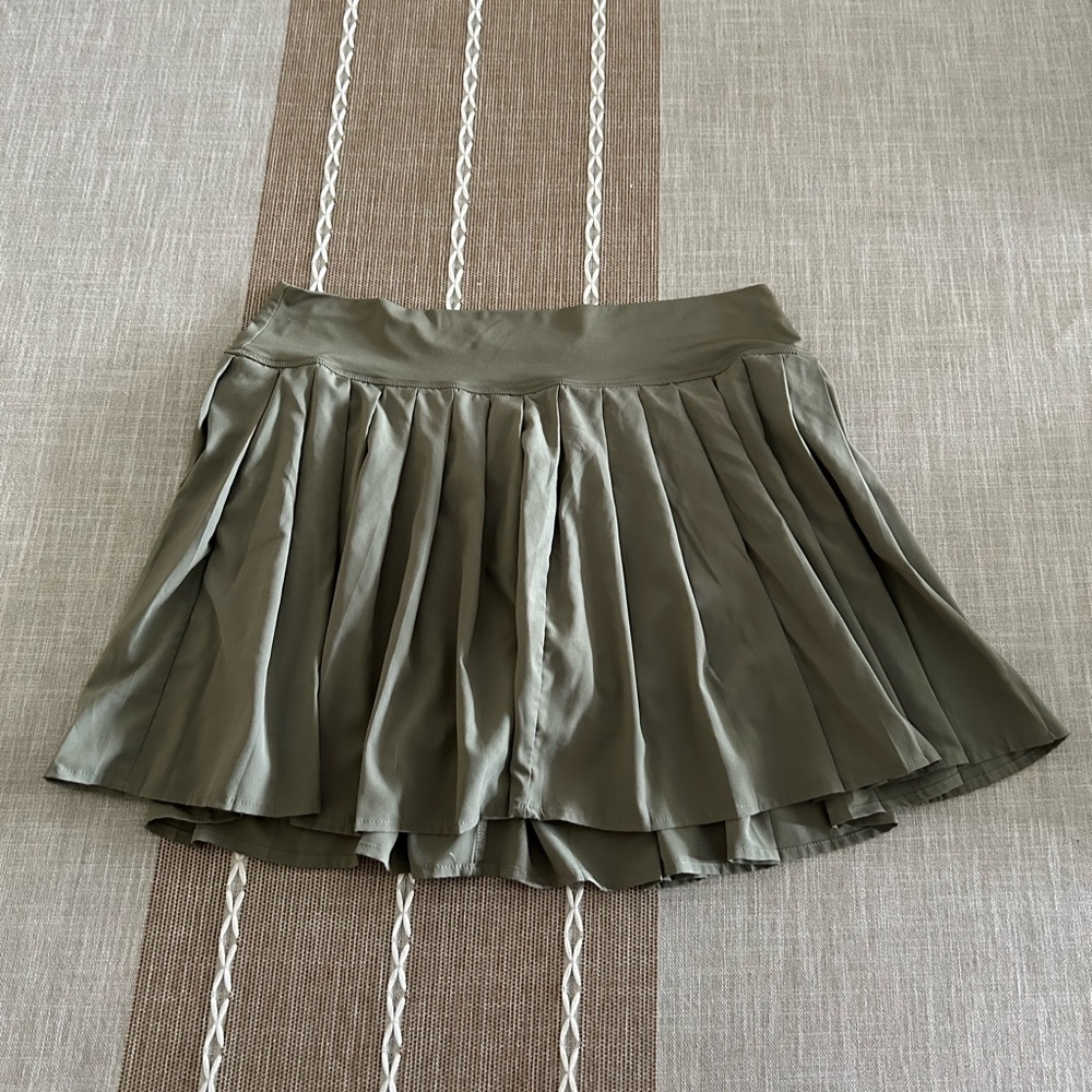 Green tennis skirt